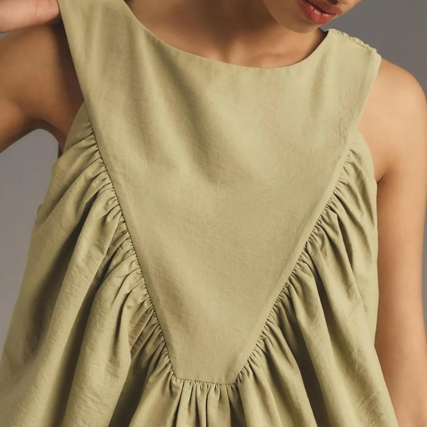 WOWULOVELY Womens Peplum Babydoll Tops Shirred Swing Tank Summer Sleeveless Pleated Flowy Vest Loose Ruffled Casual T-Shirts